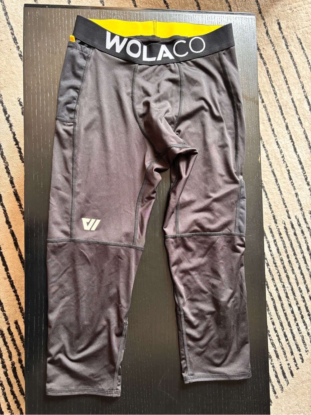 Wolaco-Men’s performance compression capri pants.